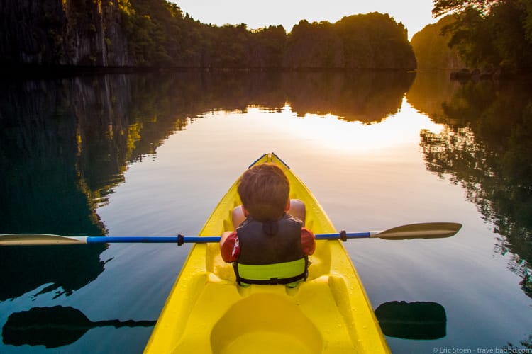 Best age to travel: Kayaking at sunrise in Palawan, Philippines