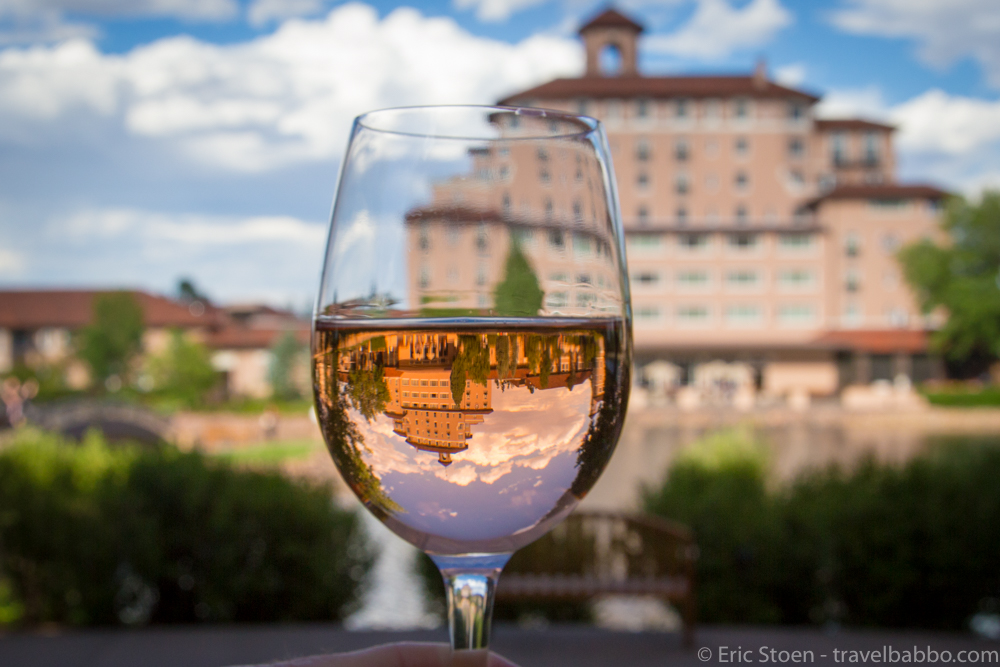 Kid-friendly hotels - Enjoying wine while the kids run off and play at Ristorante Del Lago at the Broadmoor.