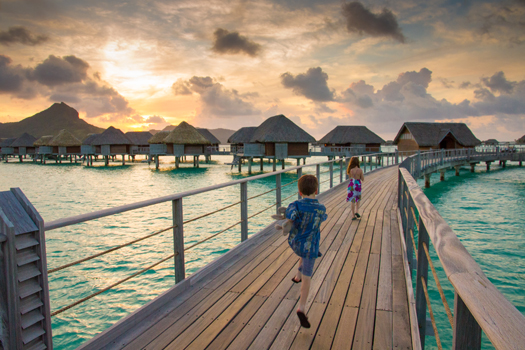 Best Travel Year - Bora Bora - Running to dinner from our overwater bungalow