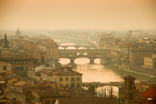 Best Travel Year - Florence - Watching the sun set over the Arno and Ponte Vecchio in Florence in March.