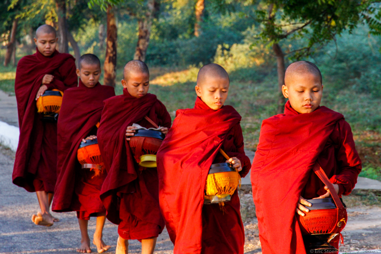 Photography trips - Myanmar Photo Trip - Young monks walking down the road in Bagan, Myanmar