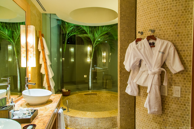 The bathroom at the Rosewood Mayakoba with kid-sized robes
