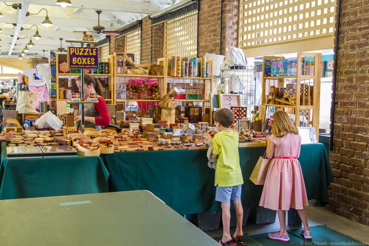Charleston with Kids: Playing with puzzles at the Historic Charleston City Market.