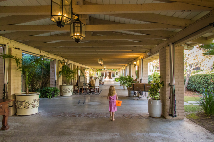 Rancho Bernardo Inn - Walking through the Inn with her trick-or-treat basket