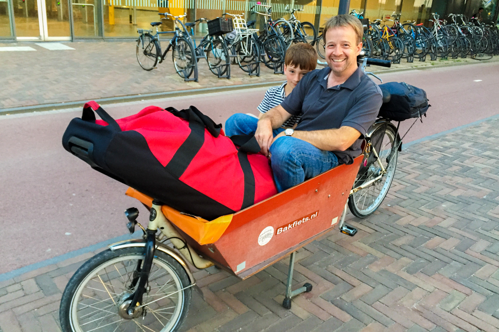 Best of 2015 Travel: On our box bike in Amsterdam, about to begin our journey through the city. 