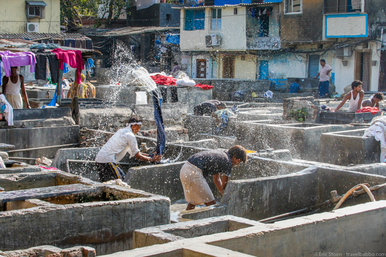 Places to visit in India - Dhobis washing clothes and sheets in a Mumbai ghat
