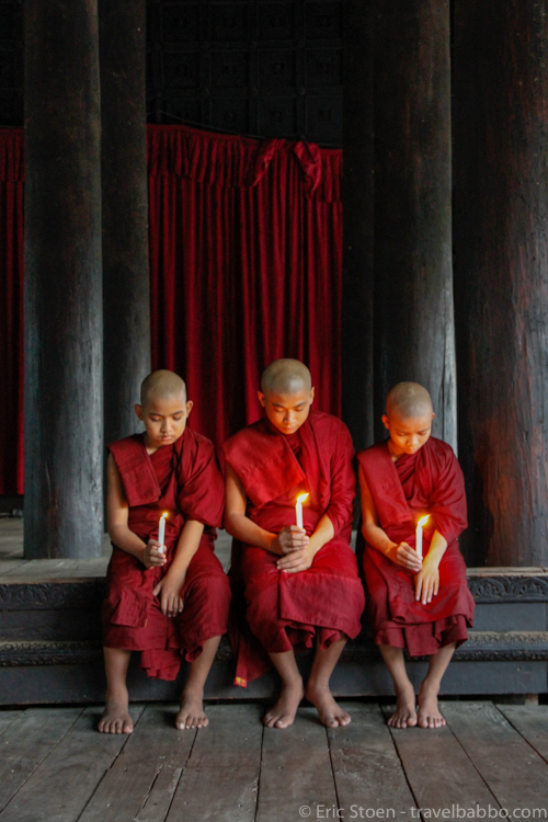 Places to go in Burma: Monks with candles at the Shwe Kyin Monastery 