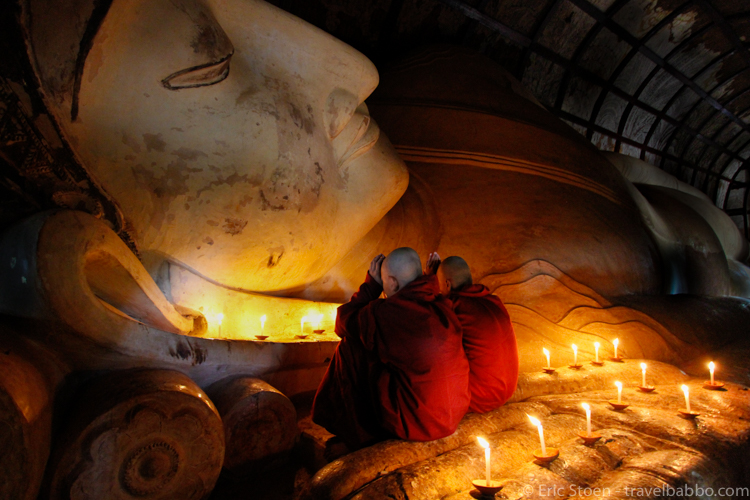 Places to see in Myanmar: Monks praying at the Shwethalyaung Reclining Buddha