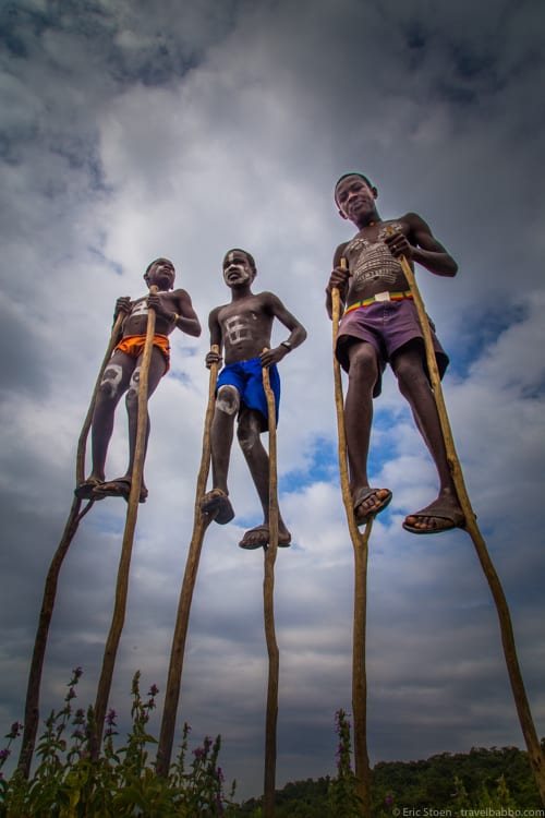 Ethiopia travel: Boys on stilts between Turmi and Jinka