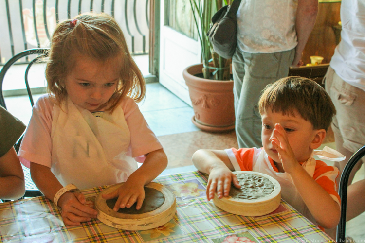 Disney port excursions - At the ceramics workshop in Palermo, Sicily. My kids' faces say it all. 