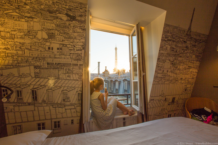 Around the world with kids - A Parisian sunset! From our room at Cler Hotel.