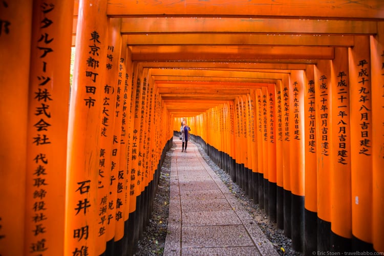 Travel Photography Tips - The iconic lines of the Fushimi Inari Taisha shrine in Kyoto. Even with the lines, though, I waited for a person to walk into the scene. 