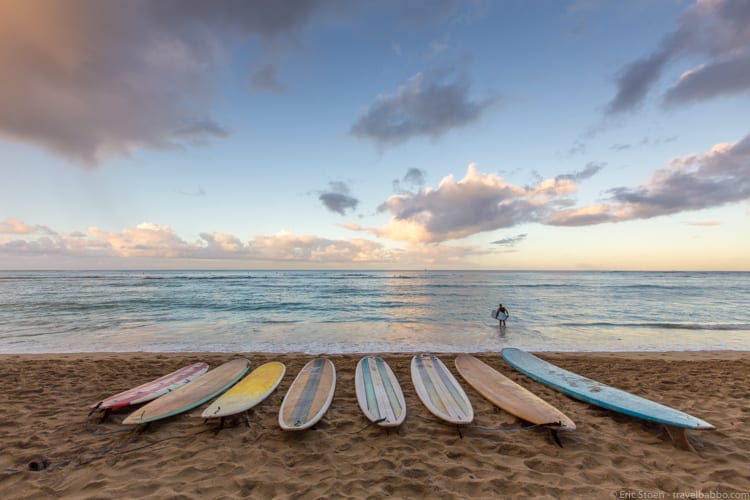 Travel Photography Tips - Early morning in Hawaii - not an interesting shot until the surfer entered the water.