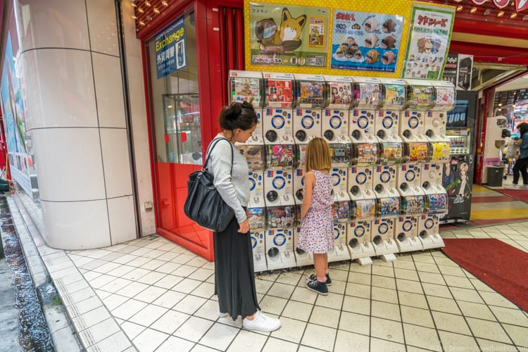 Tokyo with Kids - With Irene at a bank of capsule machines