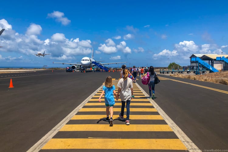 Galapagos with Kids - Walking to our plane to depart the Galapagos 