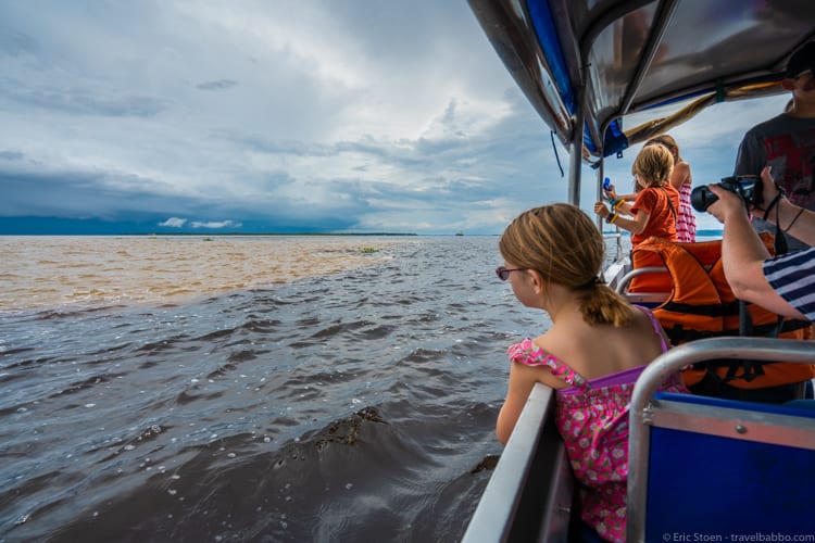 Amazon Rainforest with Kids - At the Meeting of the Waters. The Rio Negro is black. The Rio Solimões is brown. 