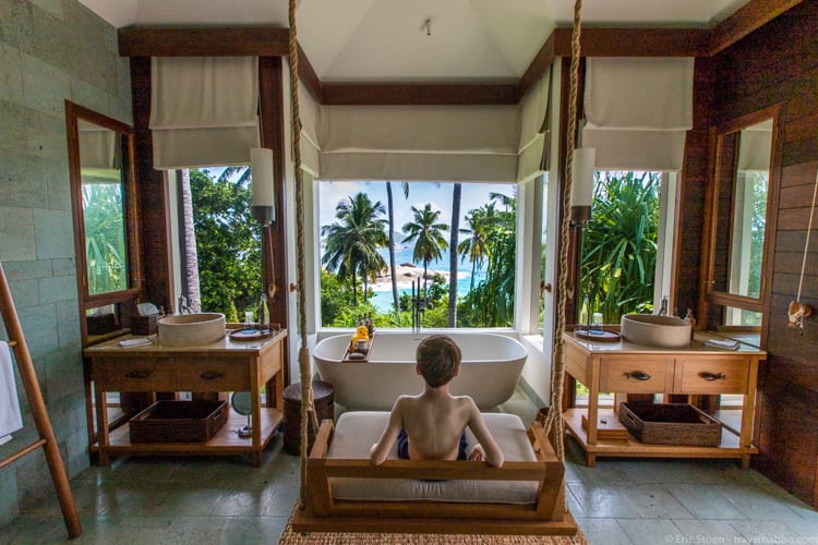Around the world - Relaxing in the Seychelles on the swinging bench in our bathroom. Definitely not stressful!