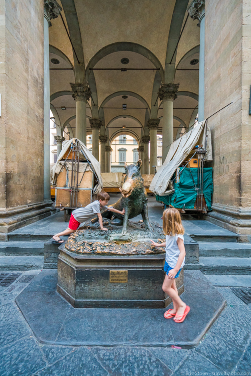 Things to do in Florence with kids - At Il Porcellino - the boar fountain. If you rub his snout, it means you'll return to Florence.