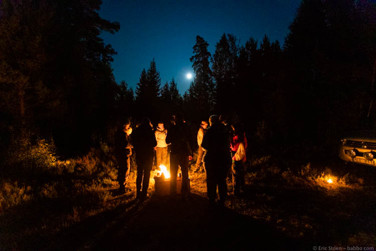 Sweden with kids - Warming up in the middle of nowhere before the wolves started to howl. No photos past this point - just memories of a magical night. 