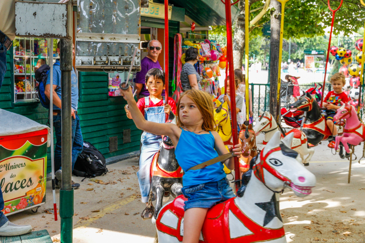 Paris with kids: Spearing brass rings at the Luxembourg Gardens carousel