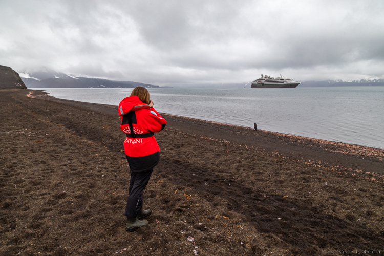 Adventures By Disney Antarctica - My daughter photographing a Chinstrap on Deception Island