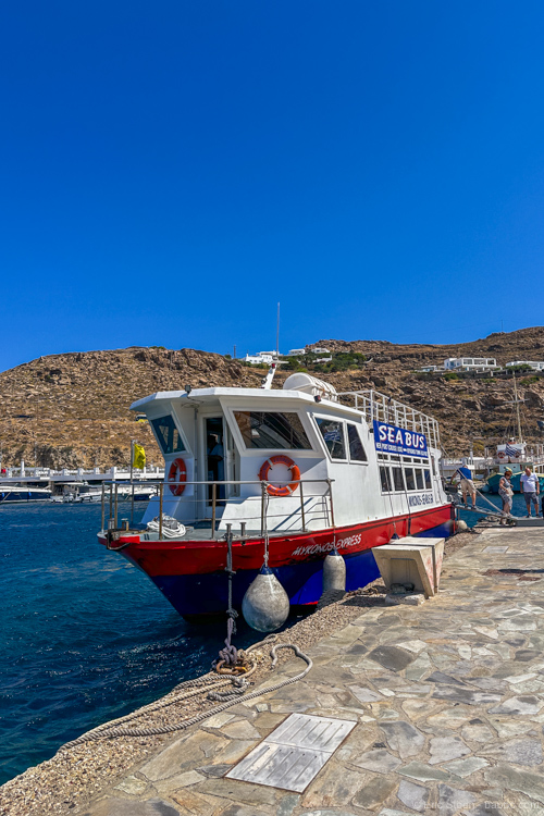 The Sea Bus is the cheapest, easiest, fastest way to get from Mykonos Town to the new port
