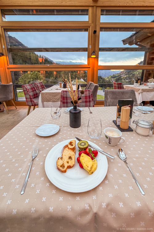Where to stay in the Dolomites: Breakfast options at the hotel include an omelette bar, a lot of fruits, breads and meats, and any coffee that you want. I loved the setting.